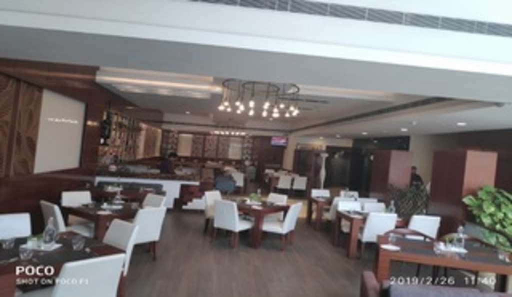 Nemesia City Center - Gurugram, Sector 29 Hotel Gurgaon Restoran gambar