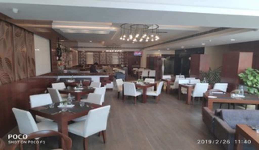 Nemesia City Center - Gurugram, Sector 29 Hotel Gurgaon Restoran gambar